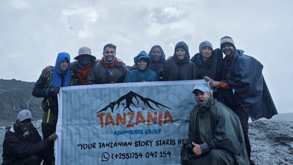 Are airport transfers and hotel nights included in the Kilimanjaro package?